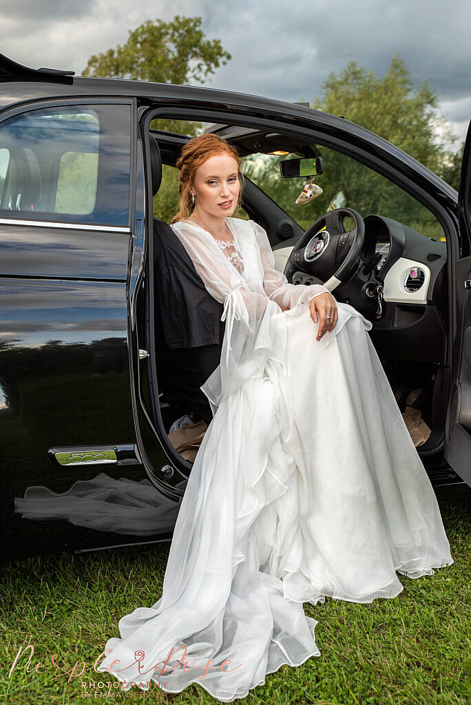 Bride sat in car