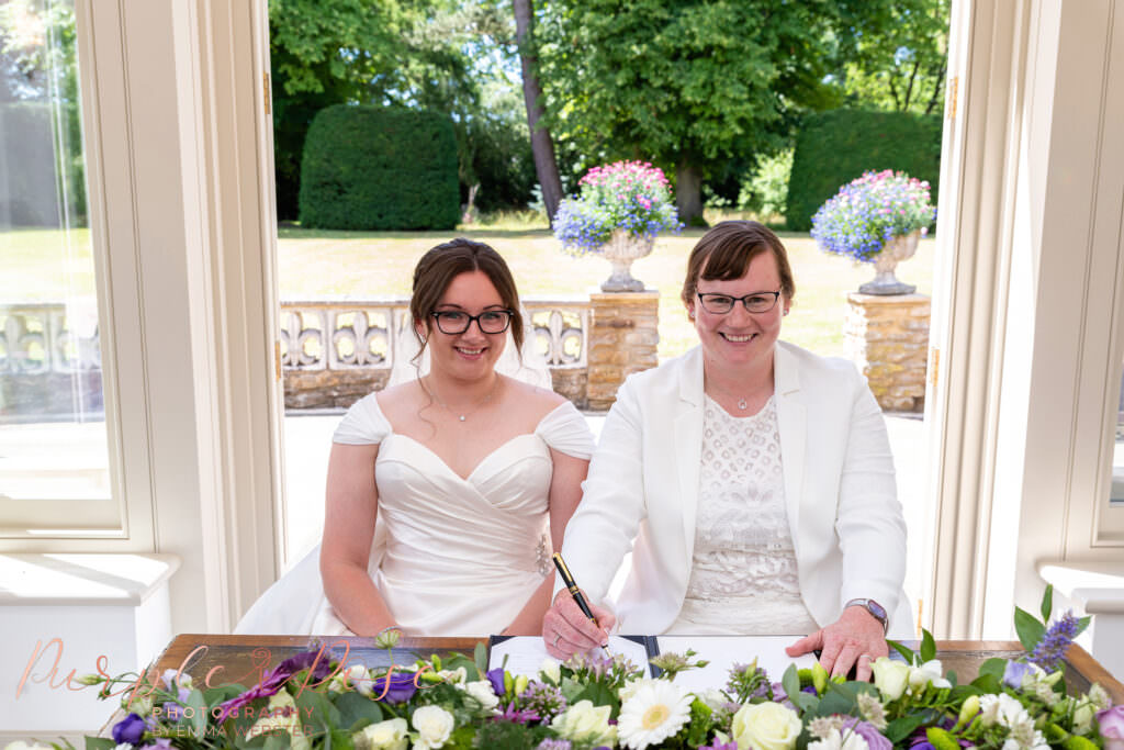 Brides signing the register
