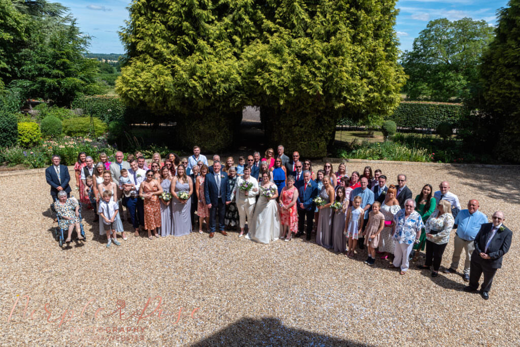 Group wedding photo at Plum Park