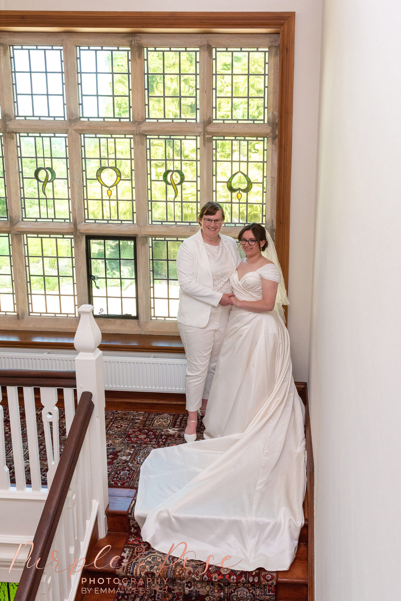 Brides on staircase