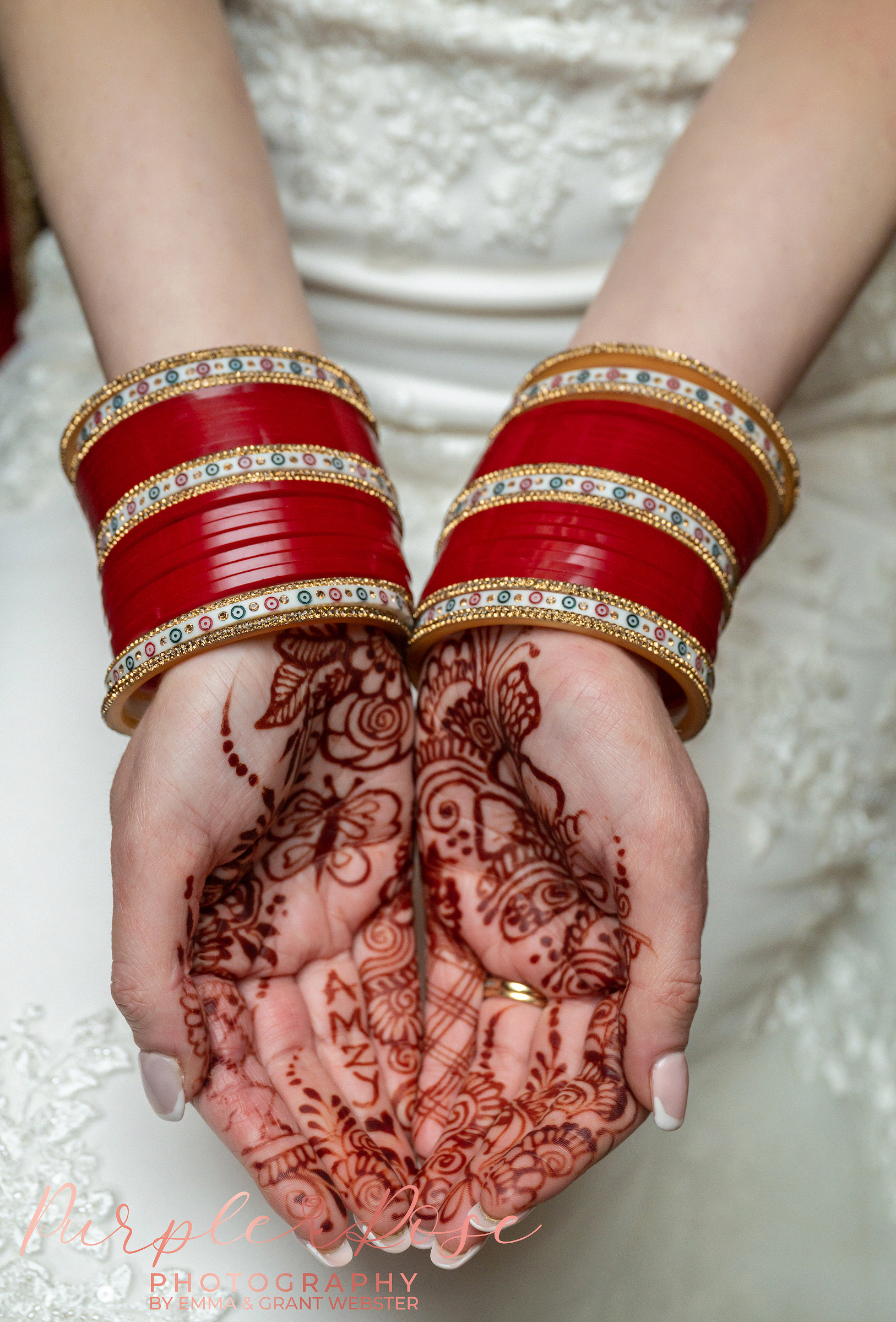 Details of a brides hands on her wedding day in Northampton
