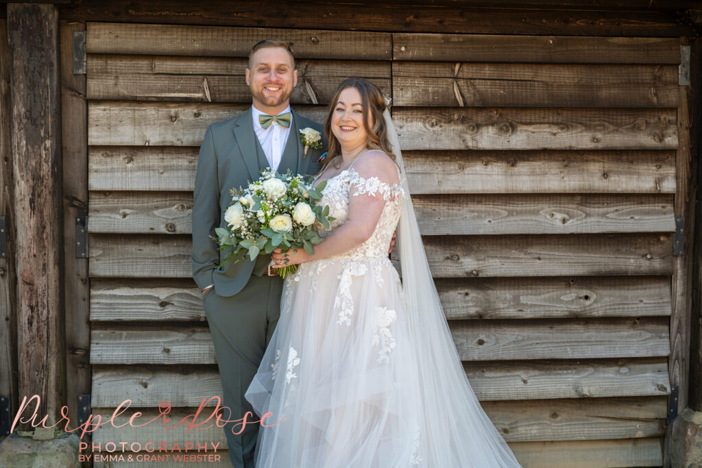Photo of a bride and groom on their wedding day at Dodford Manor in Northampton