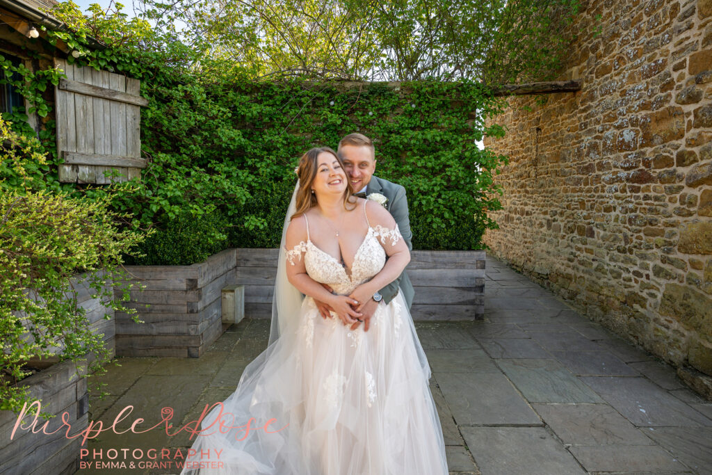 Photo of a bride and groom on their wedding day at Dodford Manor in Northampton