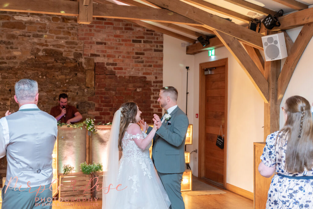 Bride and groom enjoying their first dance at Dodford Manor in Northampton