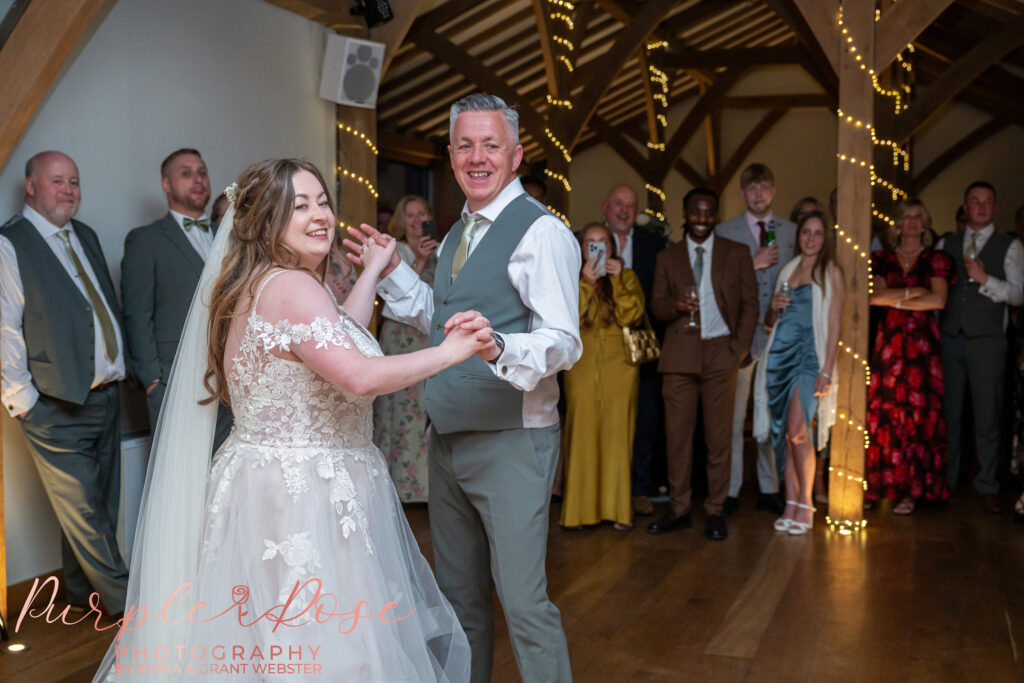 Bride and father dancing together at a wedding day in Dodford Manor, Northampton