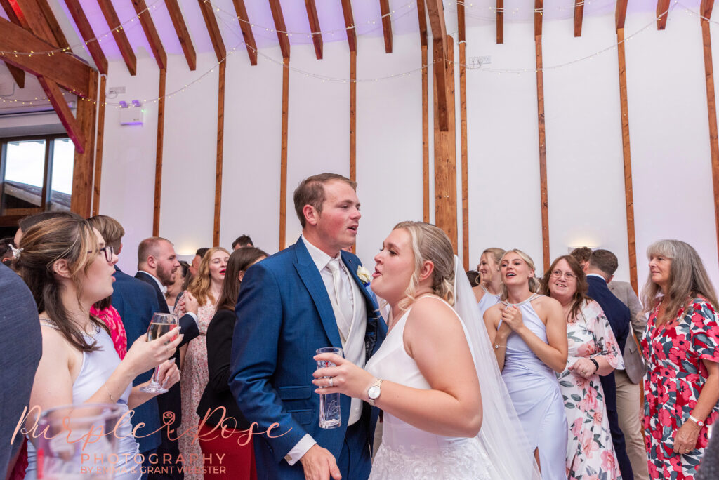 Bride and groom dancing at their barn wedding in Buckinghamshire