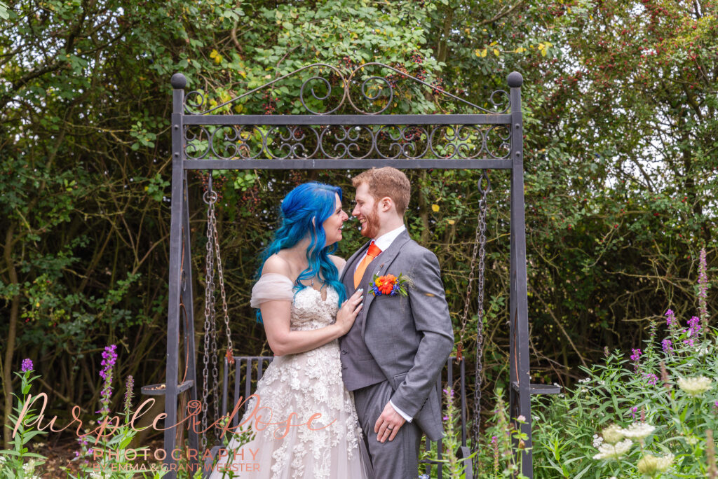 Photo of a bride and groom in a garden on their wedding day in Milton Keynes