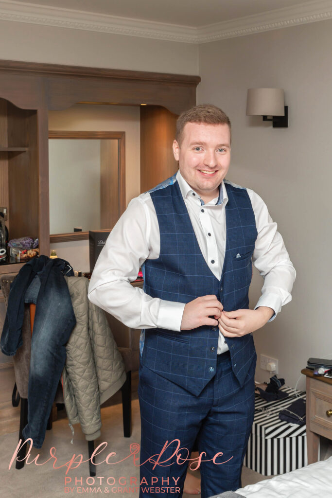 Photo of a groom getting ready for his wedding in Milton Keynes