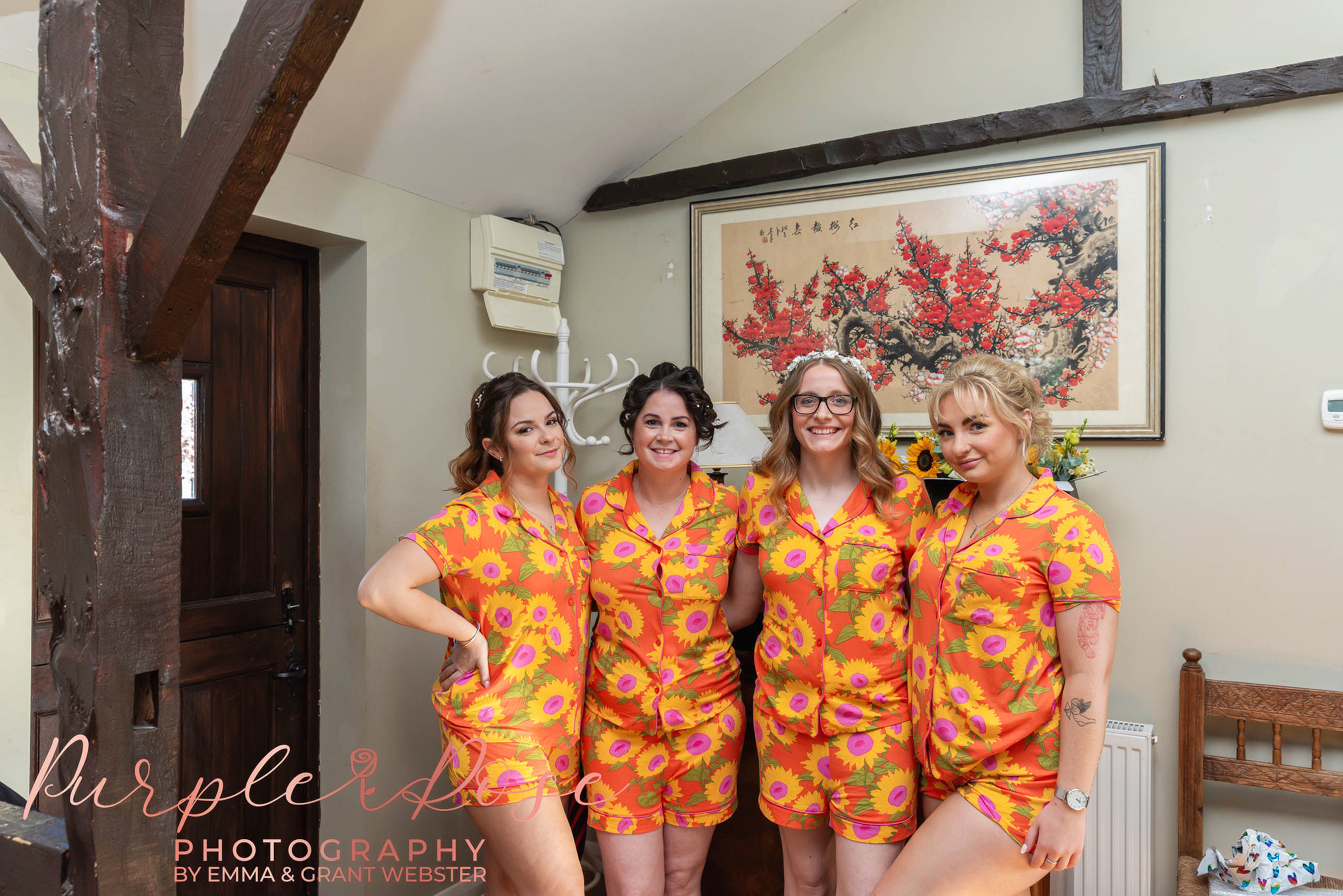 Photo of bride with her bridesmaids getting ready for her wedding in Milton Keynes