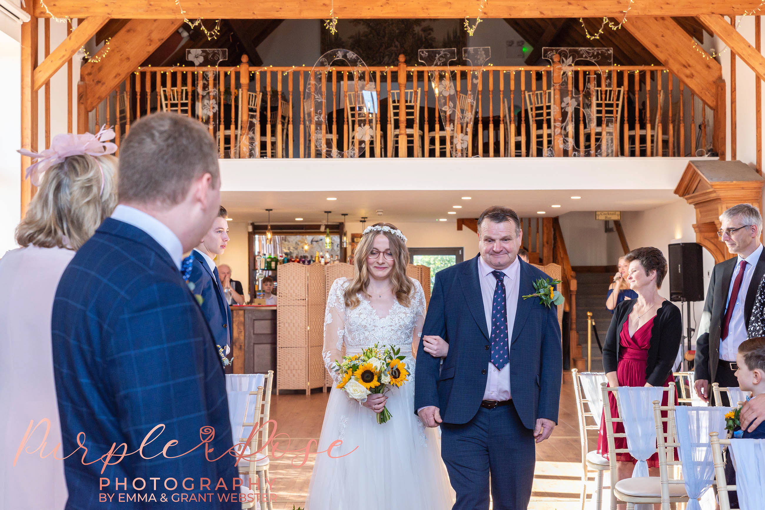 Photo of bride and her father arriving for the wedding cermony in Milton Keynes