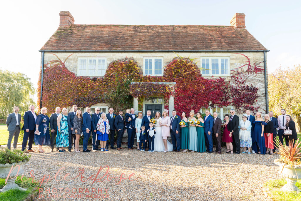 Group photo of wedding guests in Milton Keynes