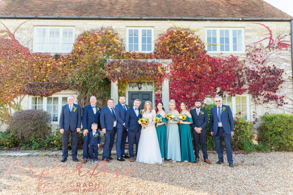 Photo of bride and groom with their bridal party in Milton Keynes