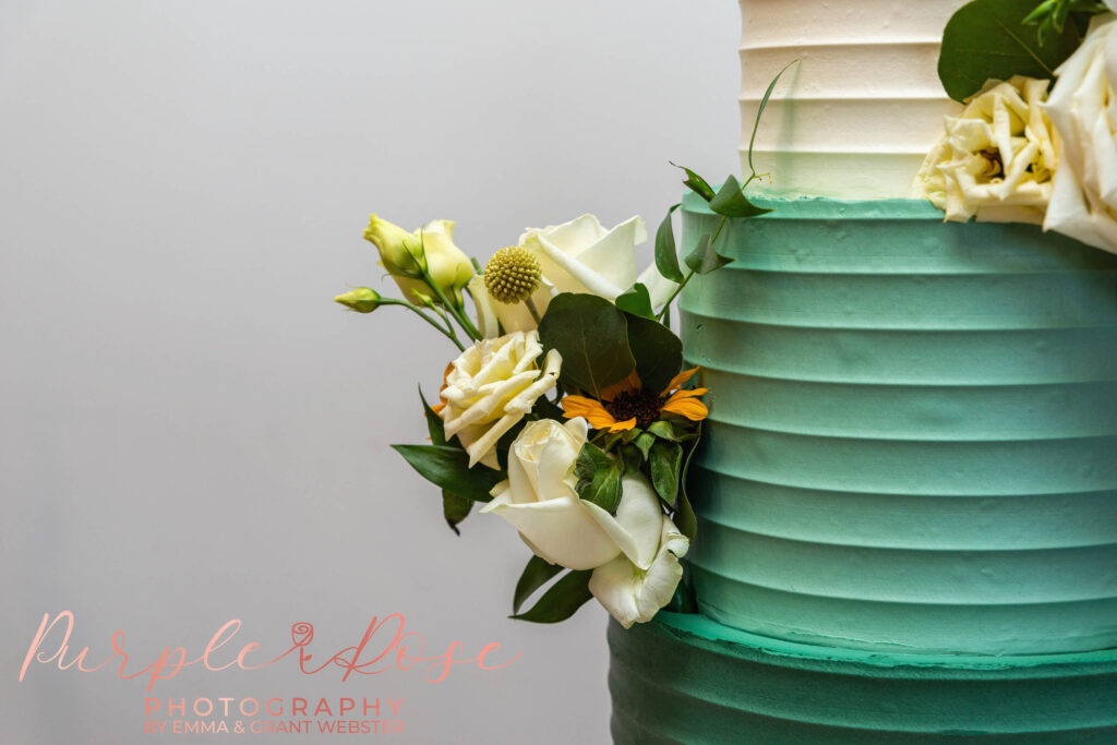 Photo of flowers on a wedding cake in Milton Keynes