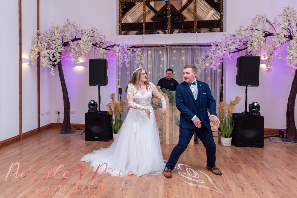 Photo of bride and groom dancing at their wedding in Milton Keynes