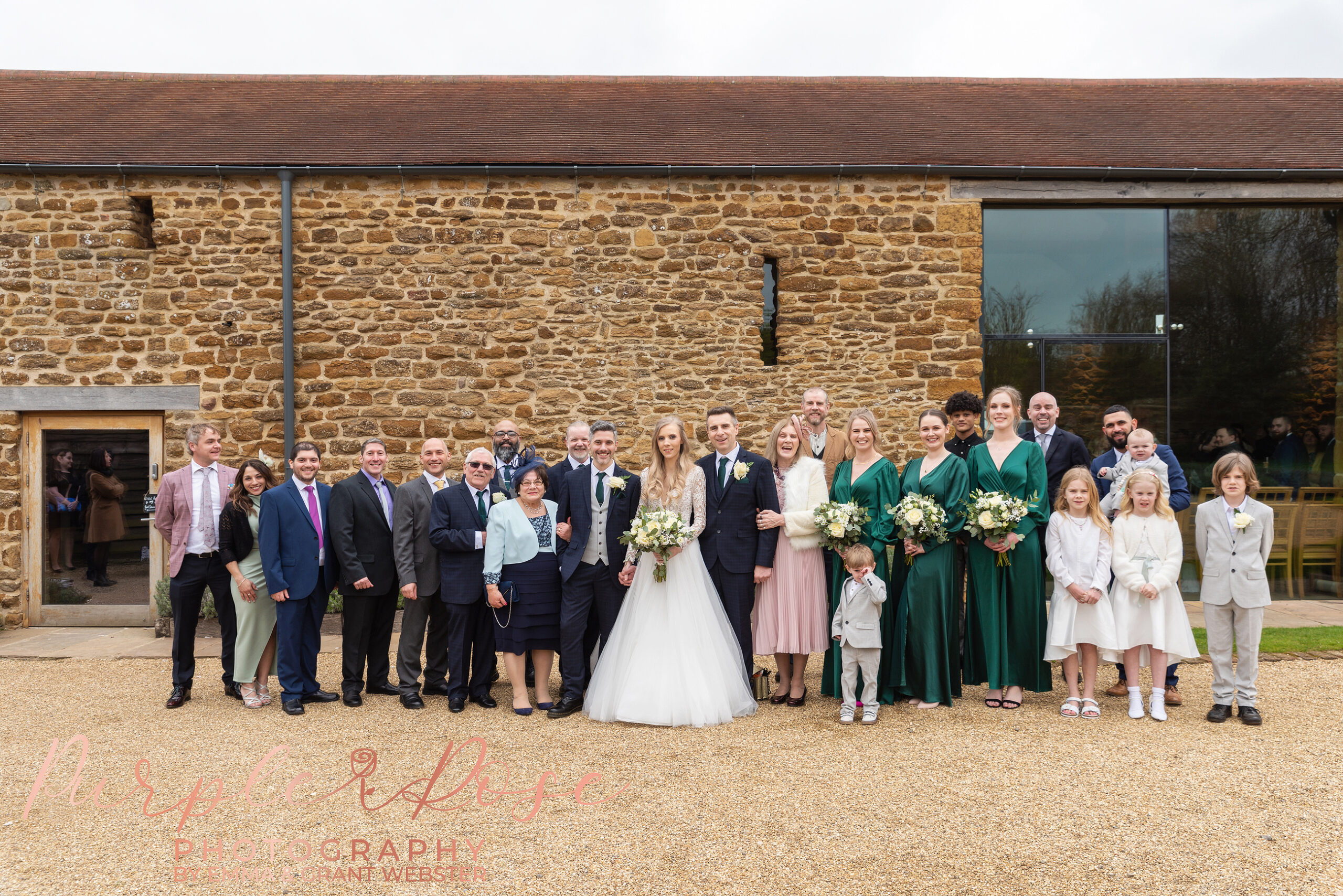 Large group photos of guests at a wedding in MIlton Keynes