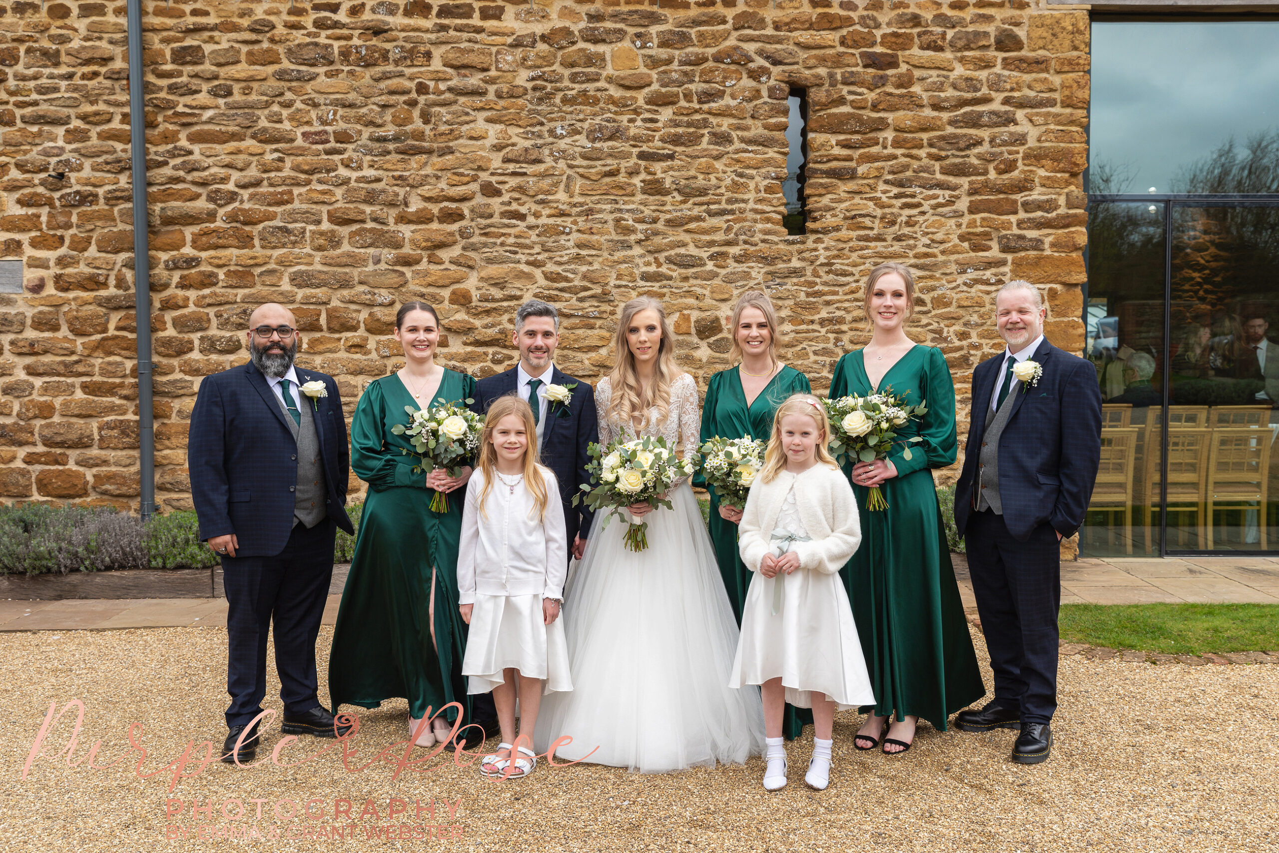 Group phot of bridal party at a wedding in Milton Keynes
