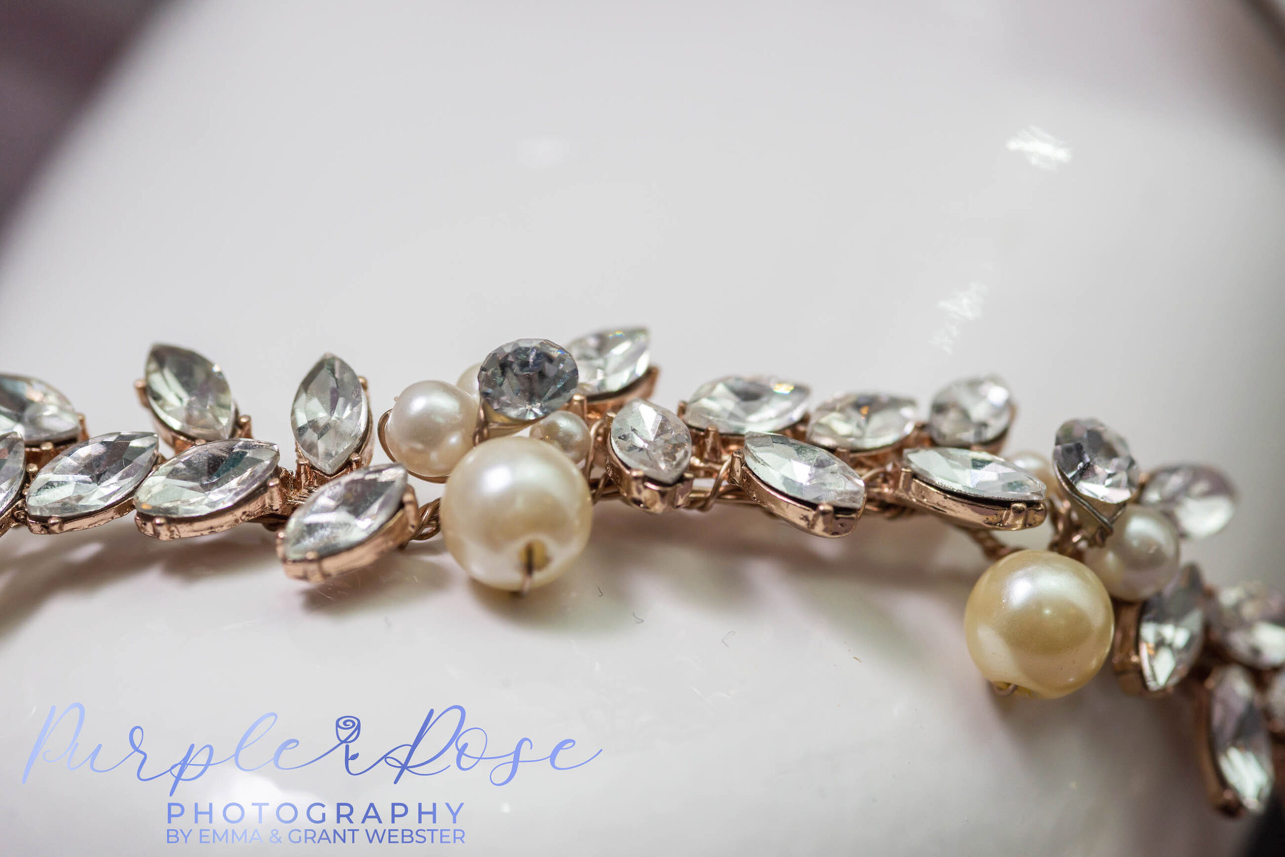 Close up phot of a brides jewellery on her wedding day in Milton Keynes
