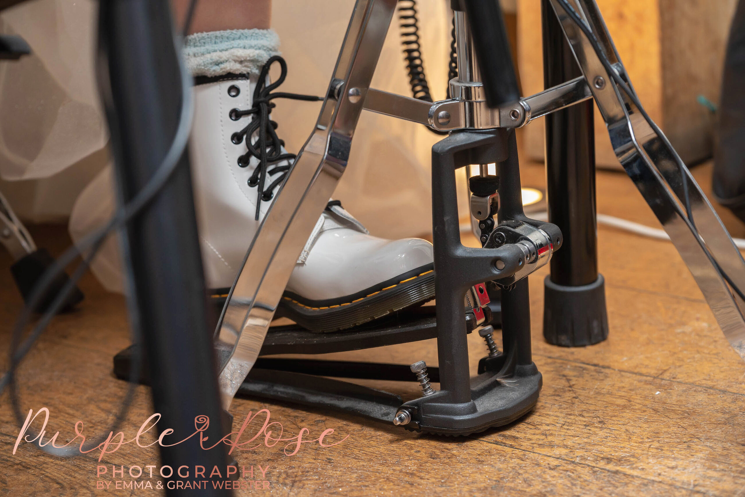Photo of a brides foot as she plays the drums on her wedding day in mIlton Keynes