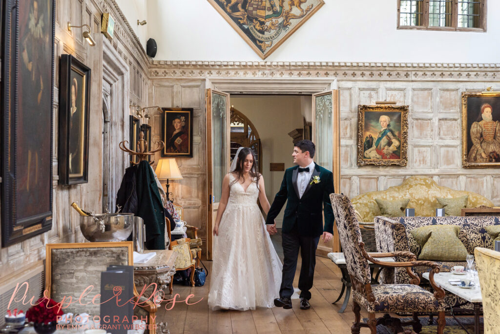 Photo of a bride and groom in the Tudor Great Hall at Fawsley Hall in Northampton