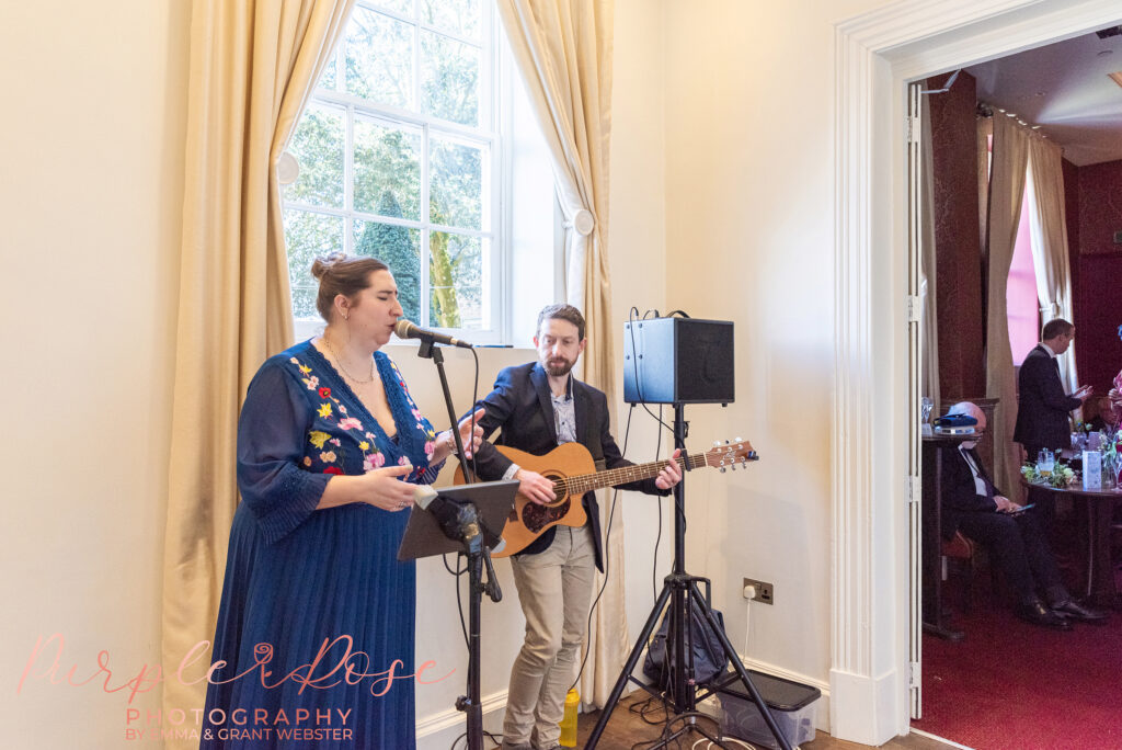 Photo of two musicians playing live at a wedding Northampton