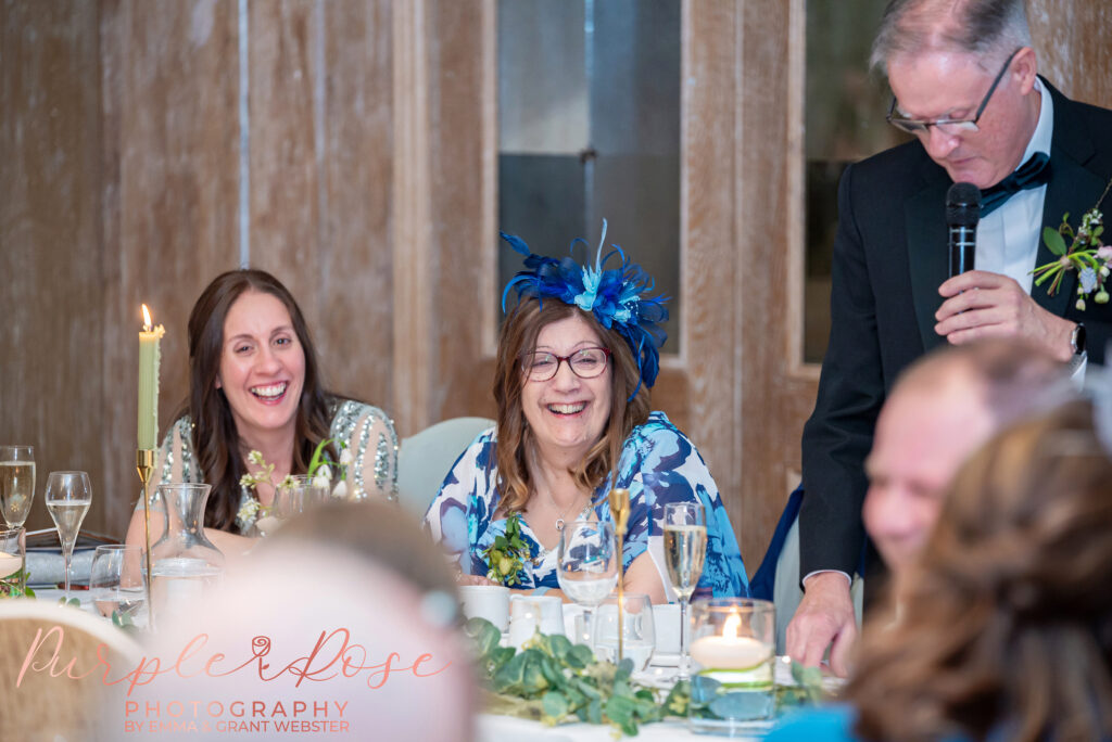 Photo of a guest laughing at a wedding Northampton