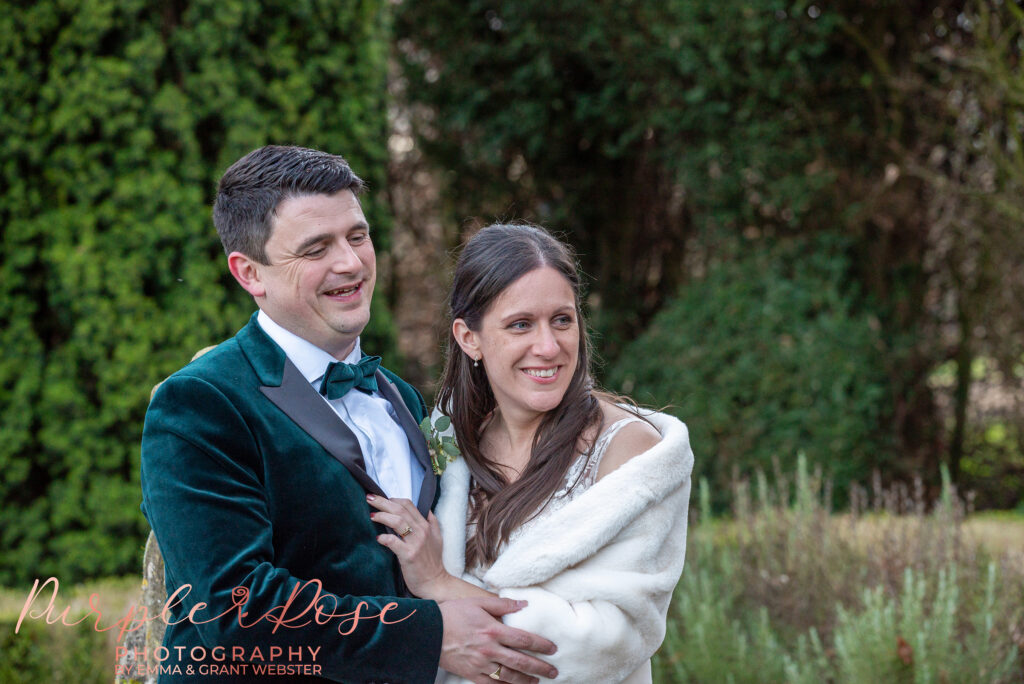 Photo of a bride and groom in the gardens of their wedding venue in Northampton