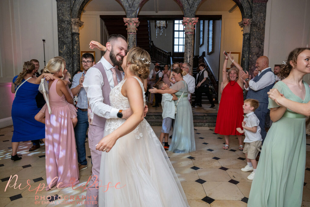 Bride and groom dancing at their wedding reception on Milton Keynes