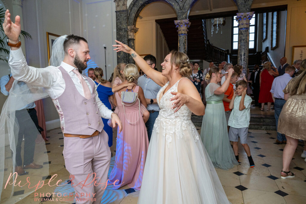 Bride and groom dancing at their wedding reception on Milton Keynes