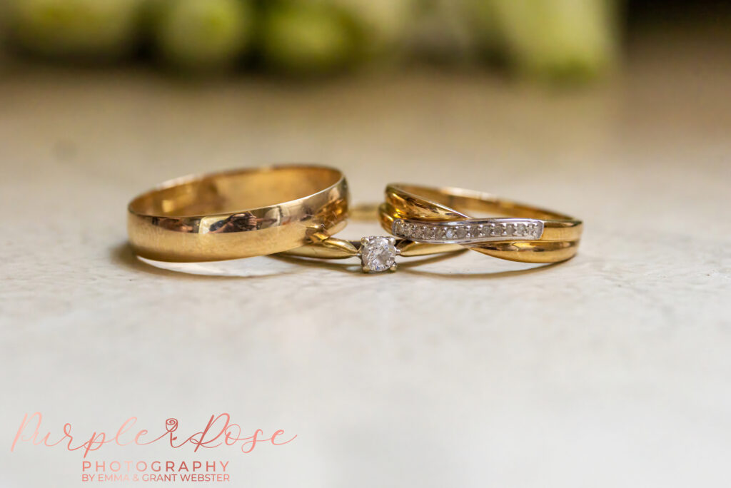 Close up photo of wedding and engagement rings ahead of a wedding at Chicheley Hall in Milton Keynes