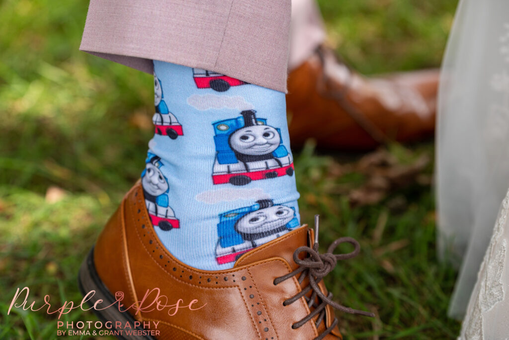 Photo of the grooms Thomas the Tank Engine socks