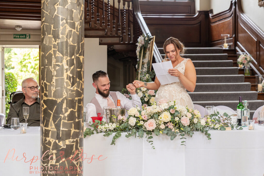 Bride giving a speech on her wedding day at Chicheley Hall in Milton Keynes