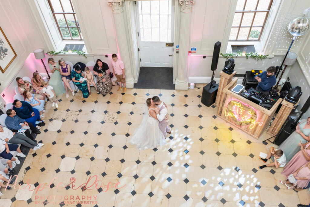 Aerial photo of a bride and groom dancing on their wedding day at Chicheley Hall in Milton Keynes
