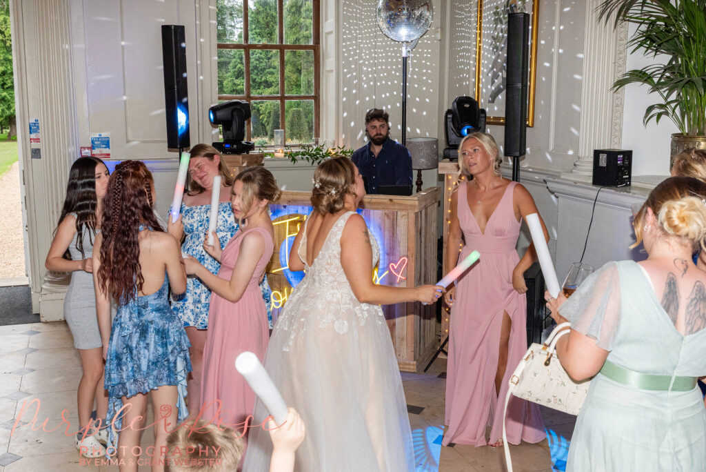 Wedding guests dancing at a wedding at Chicheley Hall in Milton Keynes