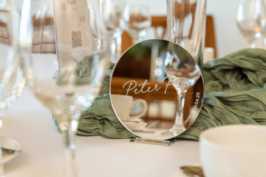 Close up of a table name with a Disney theme at Dodford manor