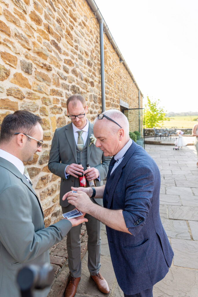 Magician entertaining wedding guests at Dodford manor